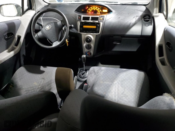 2010 Toyota Yaris with VIN JTDJT4K33A5281662, listed as a Copart auction lot 43604555 with 187,029 mi miles and Salvage Title. Bid and sale history available at DreamBid. Image 8.