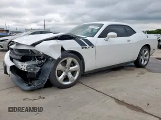 2014 Dodge Challenger R/T z VIN 2C3CDYBT4EH313762, wystawiony jako Copart lot #56105135 z przebiegiem 109 601 mil mil oraz Szkoda całkowita • Salvage title. Historia ofert i sprzedaży dostępna na DreamBid. Obrazek 1.