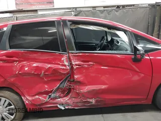 2016 Honda Fit LX with VIN JHMGK5H50GX003602, listed as a IAAI auction lot 42317398 with 58,612 mi miles and . Bid and sale history available at DreamBid. Image 13.