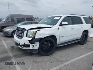 2017 GMC Yukon SLT with VIN 1GKS2BKC9HR125757, listed as a IAAI auction lot 42034182 with 72,333 mi miles. Bid and sale history available at carsss.com. Image 2.