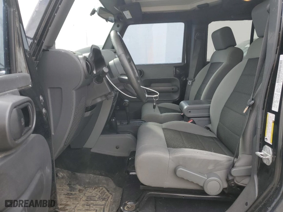 2010 Jeep Wrangler Unlimited Sport with VIN 1J4BA3H17AL125124, listed as a Copart auction lot 48826125 with 89,632 mi miles and Salvage Title. Bid and sale history available at carsss.com. Image 7.