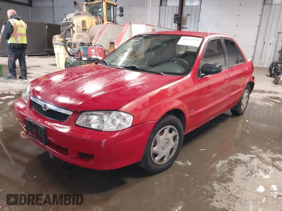 2000 Mazda Protege DX with VIN JM1BJ2220Y0258658, listed as a IAAI auction lot 41622579 with 276,682 mi miles and . Bid and sale history available at DreamBid. Image 18.