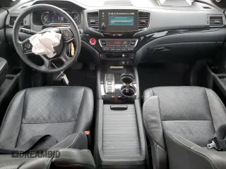 2023 Honda Passport Elite with VIN 5FNYF8H05PB013536, listed as a Copart auction lot 50671155 with 33,815 mi miles and Salvage Title. Bid and sale history available at DreamBid. Image 8.