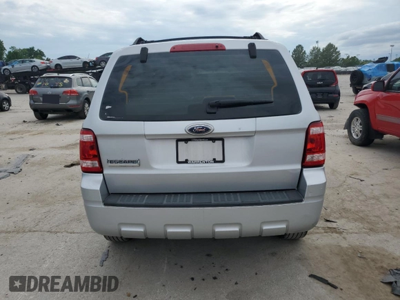 2008 Ford Escape XLS with VIN 1FMCU02Z88KE22266, listed as a Copart auction lot 63067385 with 214,026 mi miles and Salvage title. Bid and sale history available at DreamBid. Image 6.