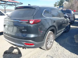2020 Mazda CX-9 Grand Touring with VIN JM3TCADY8L0405173, listed as a IAAI auction lot 41701533 with 58,119 mi miles and . Bid and sale history available at DreamBid. Image 4.