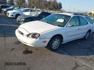 1998 Mercury Sable LS z VIN 1MEFM55U1WG608826, wystawiony jako IAAI lot #41433046 z przebiegiem 138 291 mil mil oraz . Historia ofert i sprzedaży dostępna na DreamBid. Obrazek 2.