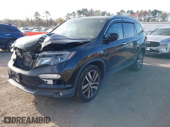2017 Honda Pilot Touring with VIN 5FNYF6H9XHB062171, listed as a IAAI auction lot 41927969 with 210,633 mi miles. Bid and sale history available at carsss.com. Image 17.
