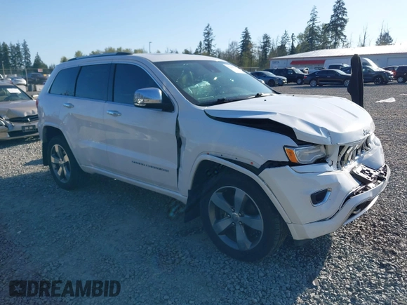 2015 Jeep Grand Cherokee Overland with VIN 1C4RJFCT6FC653386, listed as a IAAI auction lot 42084723 with 101,993 mi miles. Bid and sale history available at carsss.com. Image 1.
