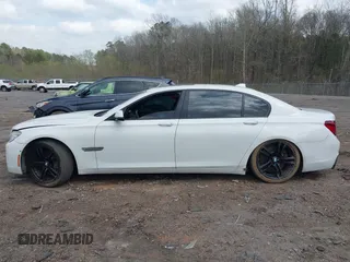 2015 BMW 7 Series 750Li with VIN WBAYE8C54FD780951, listed as a IAAI auction lot 41813038 with 103,131 mi miles. Bid and sale history available at carsss.com. Image 14.