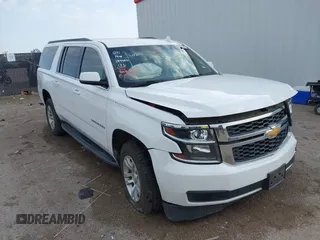 2015 Chevrolet Suburban LT with VIN 1GNSCJKC9FR702598, listed as a IAAI auction lot 41909771 with 150,206 mi miles and . Bid and sale history available at DreamBid. Image 1.