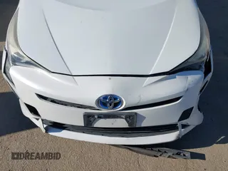 2016 Toyota Prius Two with VIN JTDKBRFUXG3001716, listed as a IAAI auction lot 42009763 with 177,132 mi miles and . Bid and sale history available at carsss.com. Image 18.