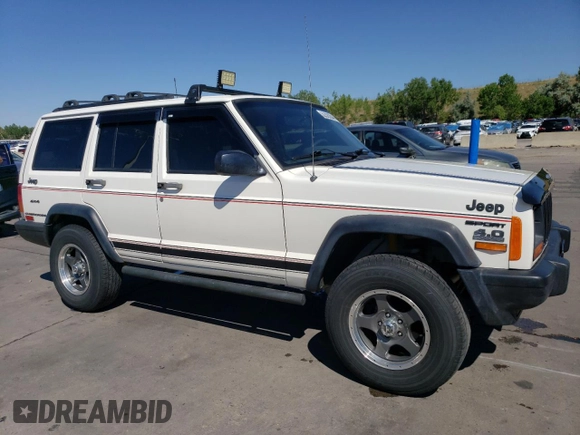 2000 Jeep Cherokee SE with VIN 1J4FF28S7YL257350, listed as a Copart auction lot 62320544 with 197,887 mi miles and Clean Title. Bid and sale history available at carsss.com. Image 4.