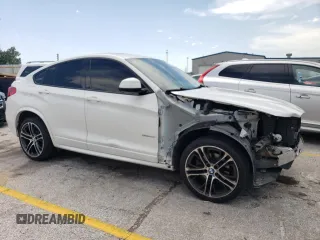 2015 BMW X4 xDrive28i with VIN 5UXXW3C54F0M89077, listed as a Copart auction lot 62282333 with 126,467 mi miles. Bid and sale history available at carsss.com. Image 4.