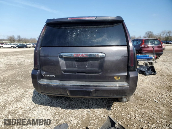 2015 GMC Yukon Denali with VIN 1GKS2CKJXFR539714, listed as a Copart auction lot 51278925 with 129,254 mi miles and Salvage Title. Bid and sale history available at carsss.com. Image 6.