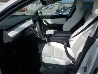 2022 Tesla Model Y Long Range z VIN 7SAYGDEE0NF339363, wystawiony jako Copart lot #44604015 z przebiegiem 48 002 mil mil oraz Szkody całkowita. Historia ofert i sprzedaży dostępna na DreamBid. Obrazek 7.