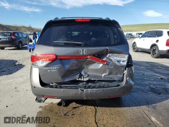 2015 Honda Odyssey Touring Elite with VIN 5FNRL5H94FB037299, listed as a Copart auction lot 53886345 with 109,032 mi miles and Salvage Title. Bid and sale history available at DreamBid. Image 6.