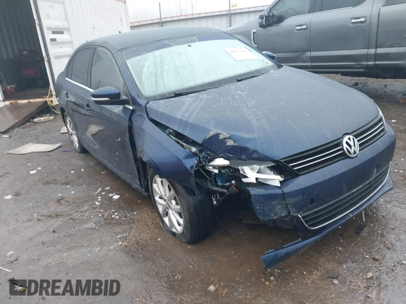 2013 Volkswagen Jetta SE z VIN 3VWDX7AJ3DM267839, wystawiony jako IAAI lot #41157583 z przebiegiem 61 643 mil mil oraz . Historia ofert i sprzedaży dostępna na DreamBid. Obrazek 1.