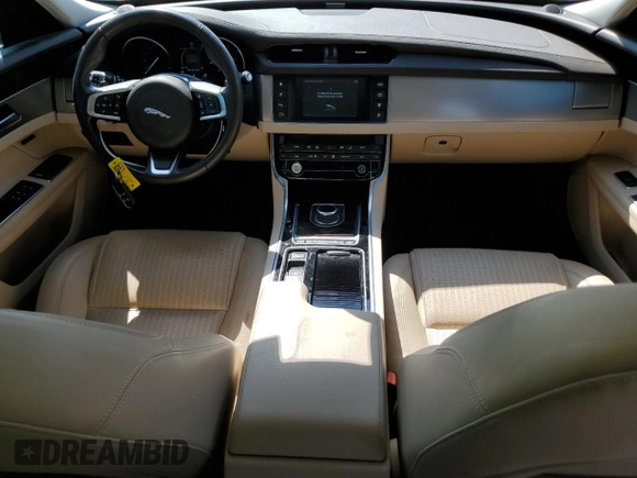 2018 Jaguar XF with VIN SAJBK4FN1JCY62528, listed as a Copart auction lot 67979364 with 46,757 mi miles and Salvage Title. Bid and sale history available at DreamBid. Image 8.