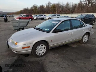 2001 Saturn SL z VIN 1G8ZK52761Z204012, wystawiony jako Copart lot #86618384 z przebiegiem 99 674 mil mil oraz Szkody całkowita. Historia ofert i sprzedaży dostępna na DreamBid. Obrazek 1.