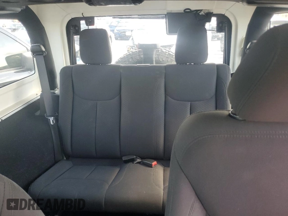 2018 Jeep Wrangler Sport S z VIN 1C4GJWAG7JL928432, wystawiony jako Copart lot #58012295 z przebiegiem 87 104 mil mil oraz Szkoda całkowita • Salvage title. Historia ofert i sprzedaży dostępna na DreamBid. Obrazek 10.
