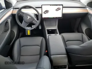 2023 Tesla Model Y Performance with VIN 7SAYGDEF4PF920859, listed as a Copart auction lot 89136705 with 8,148 mi miles and Salvage Title. Bid and sale history available at DreamBid. Image 8.