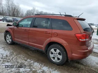 2013 Dodge Journey SE Plus with VIN 3C4PDCABXDT613045, listed as a Copart auction lot 88602235 with 255,617 mi miles and Salvage title. Bid and sale history available at DreamBid. Image 2.