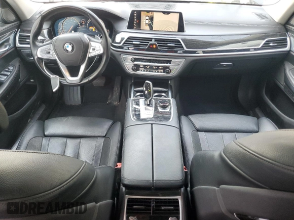2019 BMW 7 Series 740i with VIN WBA7E2C52KB217153, listed as a Copart auction lot 65205835 with 61,981 mi miles and Clean title. Bid and sale history available at DreamBid. Image 8.