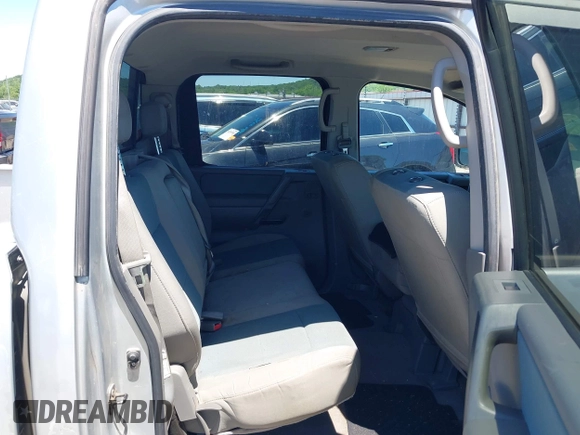 2007 Nissan Titan XE with VIN 1N6AA07AX7N231823, listed as a IAAI auction lot 42300587 with 210,735 mi miles and . Bid and sale history available at DreamBid. Image 8.