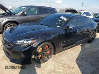 2020 Kia Stinger GT2 with VIN KNAE55LC7L6071883, listed as a Copart auction lot 74814574 with 23,714 mi miles and Non Repairable. Bid and sale history available at carsss.com. Image 1.