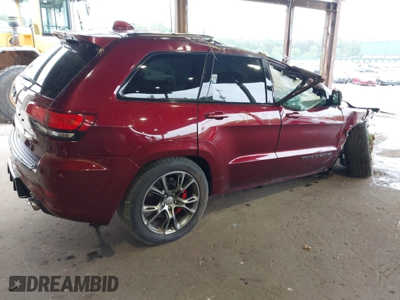 2018 Jeep Grand Cherokee SRT z VIN 1C4RJFDJ0JC231510, wystawiony jako IAAI lot #42445896 z przebiegiem 85 000 mil mil oraz . Historia ofert i sprzedaży dostępna na DreamBid. Obrazek 4.