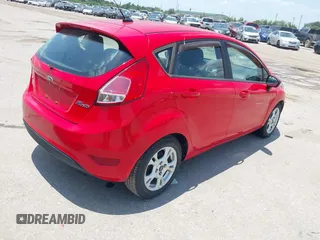 2015 Ford Fiesta SE z VIN 3FADP4EJ4FM166653, wystawiony jako IAAI lot #42410322 z przebiegiem 141 305 mil mil oraz . Historia ofert i sprzedaży dostępna na DreamBid. Obrazek 4.