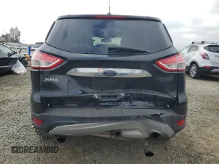 2014 Ford Escape Titanium with VIN 1FMCU9J90EUC89590, listed as a Copart auction lot 43985065 with 128,878 mi miles and Salvage Title. Bid and sale history available at carsss.com. Image 6.