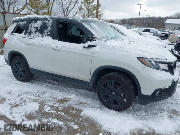 2021 Honda Passport Sport with VIN 5FNYF8H29MB009406, listed as a IAAI auction lot 41246817 with 71,997 mi miles and . Bid and sale history available at DreamBid. Image 1.