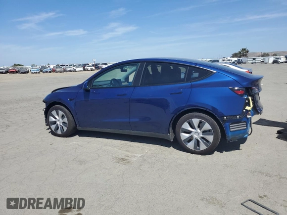 2024 Tesla Model Y Long Range z VIN 7SAYGAEE3RF034699, wystawiony jako Copart lot #54523815 z przebiegiem 9 764 mil mil oraz Szkoda całkowita • Salvage title. Historia ofert i sprzedaży dostępna na DreamBid. Obrazek 2.