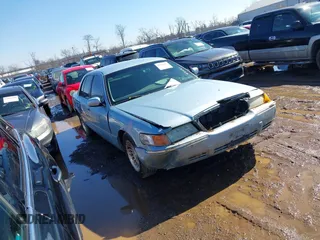 2002 Mercury Grand Marquis LS Premium with VIN 2MEFM75W32X663151, listed as a IAAI auction lot 41668229 with 152,151 mi miles and . Bid and sale history available at DreamBid. Image 1.