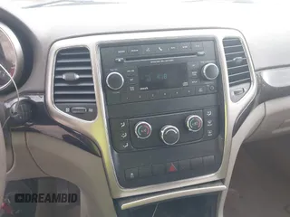 2011 Jeep Grand Cherokee Laredo with VIN 1J4RS4GGXBC564035, listed as a IAAI auction lot 41931861 with 242,291 mi miles and . Bid and sale history available at DreamBid. Image 14.