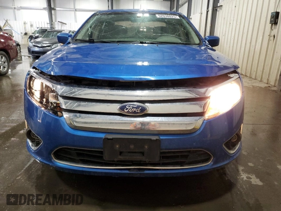 2012 Ford Fusion SE with VIN 3FAHP0HA3CR325781, listed as a Copart auction lot 52038025 with 134,349 mi miles and Salvage Title. Bid and sale history available at DreamBid. Image 5.