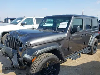 2022 Jeep Wrangler Unlimited Sport S with VIN 1C4HJXDG5NW105931, listed as a IAAI auction lot 42349628 with 37,314 mi miles and . Bid and sale history available at DreamBid. Image 2.