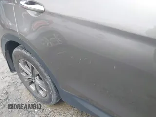 2016 Hyundai Santa Fe z VIN 5XYZU3LB1GG358111, wystawiony jako IAAI lot #42377494 z przebiegiem 92 745 mil mil oraz . Historia ofert i sprzedaży dostępna na DreamBid. Obrazek 6.