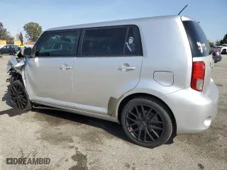 2012 Scion xB with VIN JTLZE4FE3C1143496, listed as a Copart auction lot 52157215 with 223,376 mi miles and Salvage Title. Bid and sale history available at carsss.com. Image 2.