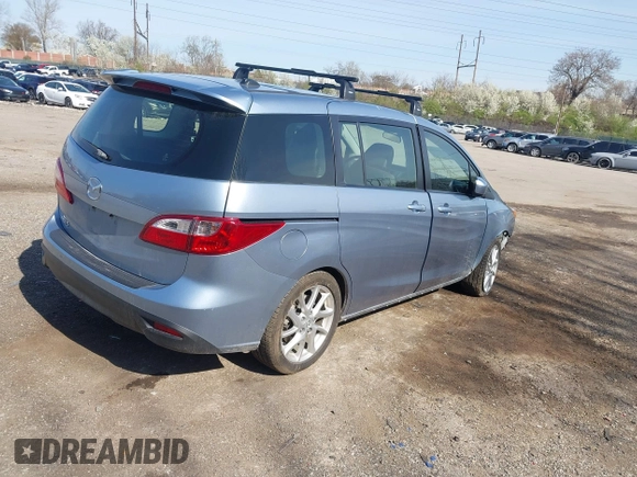 2012 Mazda 5 Grand Touring with VIN JM1CW2DL6C0138979, listed as a IAAI auction lot 41936188 with 57,963 mi miles and . Bid and sale history available at carsss.com. Image 4.