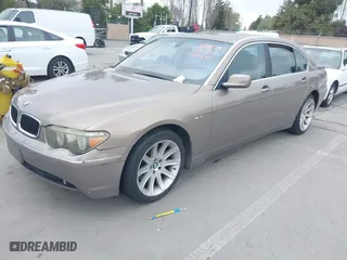 2004 BMW 7 Series 745Li with VIN WBAGN63494DS45716, listed as a IAAI auction lot 41906522 with 127,292 mi miles. Bid and sale history available at carsss.com. Image 6.