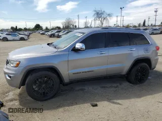 2018 Jeep Grand Cherokee Limited with VIN 1C4RJEBG0JC339160, listed as a Copart auction lot 52449575 with 97,339 mi miles and Salvage title. Bid and sale history available at DreamBid. Image 1.