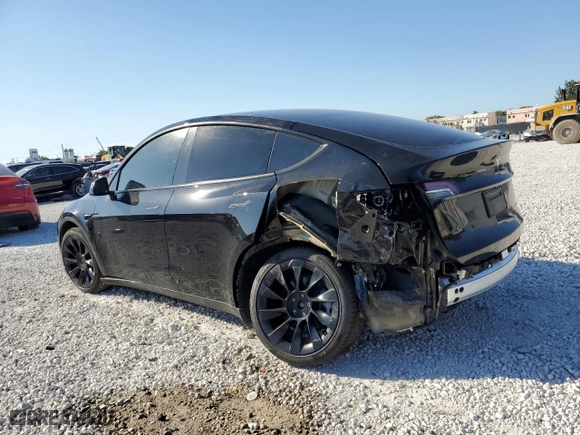 2024 Tesla Model Y Long Range with VIN 7SAYGDEE9RA303397, listed as a Copart auction lot 47416965 with 10,598 mi miles and Salvage Title. Bid and sale history available at carsss.com. Image 2.