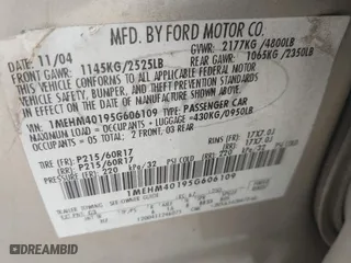 2005 Mercury Montego with VIN 1MEHM40195G606109, listed as a IAAI auction lot 40739316 with 329,715 mi miles. Bid and sale history available at carsss.com. Image 9.