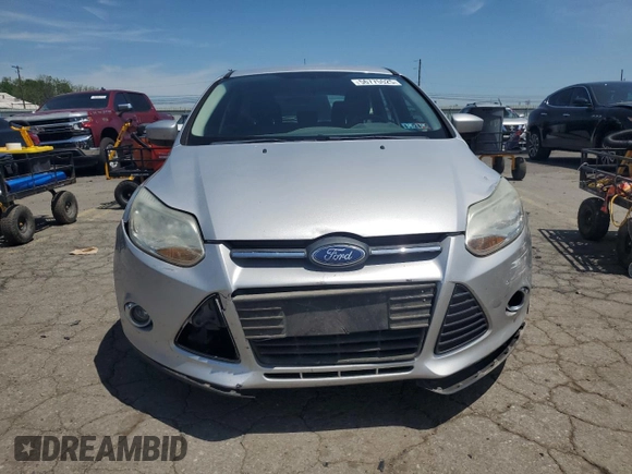 2012 Ford Focus SE z VIN 1FAHP3K2XCL270196, wystawiony jako Copart lot #57319575 z przebiegiem 80 364 mil mil oraz Szkoda całkowita • Salvage title. Historia ofert i sprzedaży dostępna na DreamBid. Obrazek 5.