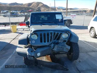 2014 Jeep Wrangler Unlimited Rubicon X with VIN 1C4BJWFG3EL134522, listed as a IAAI auction lot 41221381 with 66,897 mi miles and . Bid and sale history available at DreamBid. Image 12.