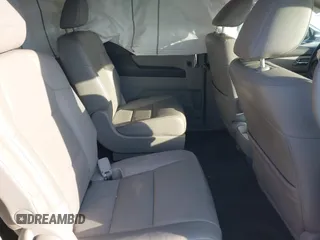 2014 Honda Odyssey Touring with VIN 5FNRL5H90EB077054, listed as a IAAI auction lot 41904456 with 197,869 mi miles and . Bid and sale history available at carsss.com. Image 8.