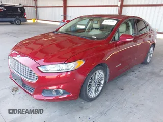 2013 Ford Fusion SE Hybrid z VIN 3FA6P0LU9DR183625, wystawiony jako IAAI lot #42338533 z przebiegiem 159 546 mil mil oraz . Historia ofert i sprzedaży dostępna na DreamBid. Obrazek 2.