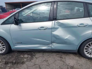 2013 Ford C-Max SE z VIN 1FADP5AU4DL511362, wystawiony jako IAAI lot #42073682 z przebiegiem 160 960 mil mil oraz . Historia ofert i sprzedaży dostępna na DreamBid. Obrazek 6.